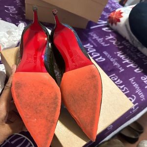 Christian Louboutin green alligator skin shoes very gently used only wore twice